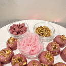 Chocolate On Purpose Ruby Pistachio Truffles with layers of Pashmak (persian ferry floss) and creamy pistachio butter, dipped in pink ruby chocolate, and topped with roasted pistachio nuts, pictured with ingredients. A delicious Valentine’s Day gift idea