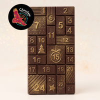 Warruyarra (to count in Wiradjuri language) dark chocolate advent calendar bar with Gulalung (Finger Lime), 24 numbered windows with gold lustre dust. Chocolate On Purpose logo of Eagle, with Spirit within.