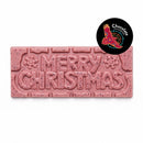 Merry Christmas white chocolate bar with Ooray (Davidson Plum), pink with berry flecks and "Merry Christmas and snowflakes embossed, on a white background. Chocolate On Purpose logo of Eagle, with Spirit within in the top right hand corner.