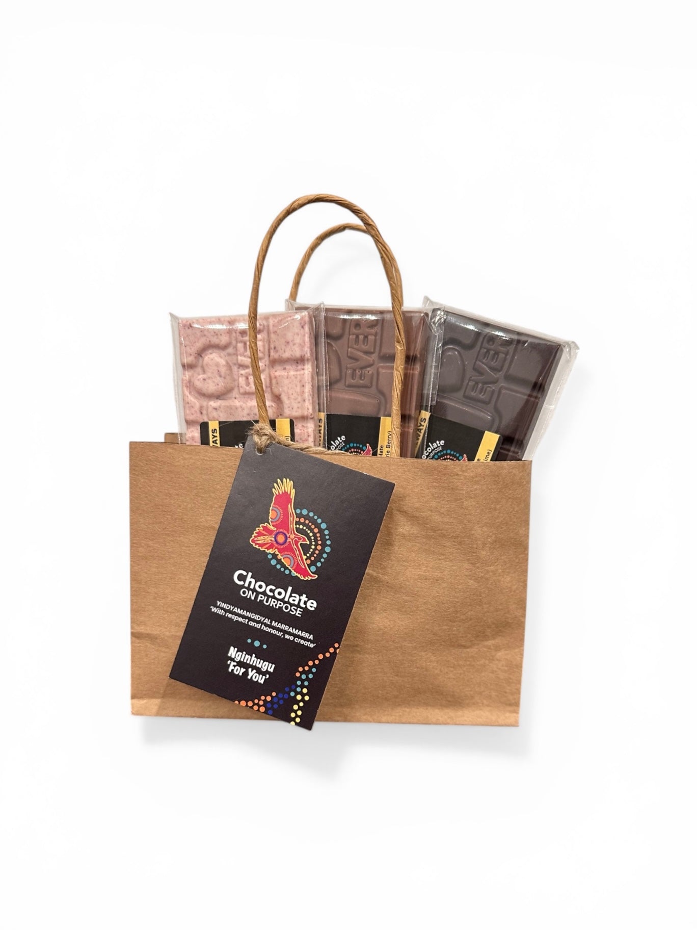 Chocolate On Purpose Mother's Day Chocolate Gift Bag. Bag made of Kraft Brown paper with Gift Swing Tag hanging from string handle. Gift Card displays Chocolate On Purpose Eagle logo with a Wiradjuri message, 