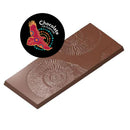 Chocolate On Purpose® artisan chocolate bar featuring Nautilus shell embossing with Indigenous Galah artwork. Premium dark chocolate with Australian native botanical ingredients. Chocolate On Purpose® logo with red Galah and dot art design on black circular badge. 100% Indigenous-owned, ethically sourced, Fair Trade certified chocolate. Perfect for conscious gifting and cultural celebration.