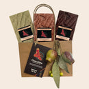 NAIDOC 2026 gift bag with three Walking On Country bush food chocolate bars - white chocolate with Girri Girri (Lemon Myrtle), milk chocolate with Munthari (Muntrie Berry) and dark chocolate with Gulalung (Finger Lime0 - aboriginal chocolate gifts Australia - Chocolate On Purpose