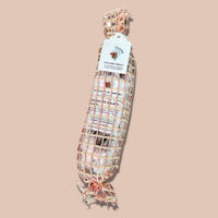 Chocolate Salami on beige background